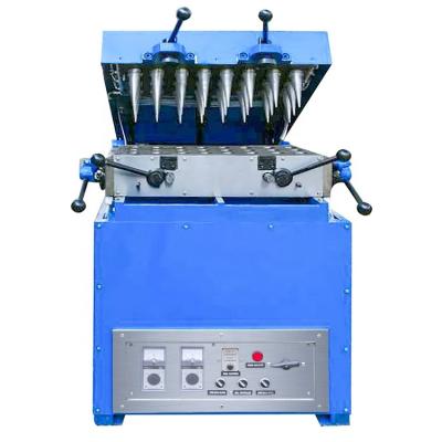 China Snack Factory 24 Modules Squeeze Type Egg Rack Machine Ice Cream Egg Tray Machine for sale