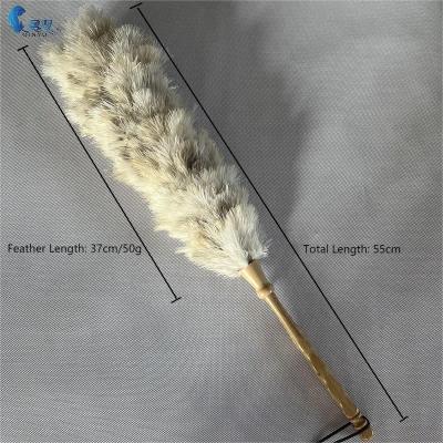 China Factory price viable natural white fluffy household anti-static soft and reusable ostrich feather duster with wooden handle for sale