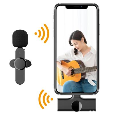 China Hot Selling Lossless Mini Portable Sound Transmission Live Streaming Lavalier Lapel Wireless Microphone Set For Camera Cell Phone Computer for sale