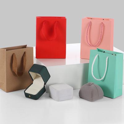 China Recycled Materials Cheap Wholesale Clothing Jewelry Cosmetic Boutique Gift Shopping Bag Custom Printed Luxury Paper Tote Bags for sale