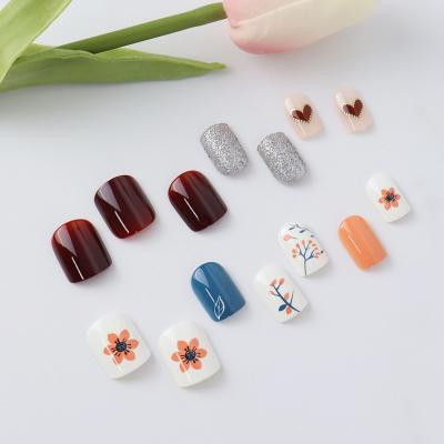 China New Arrival 24Pcs Soft Soft Gel Nail Tips Short Square Press On Nails Building Gel Designed French Swirl Cute Press On Nails for sale