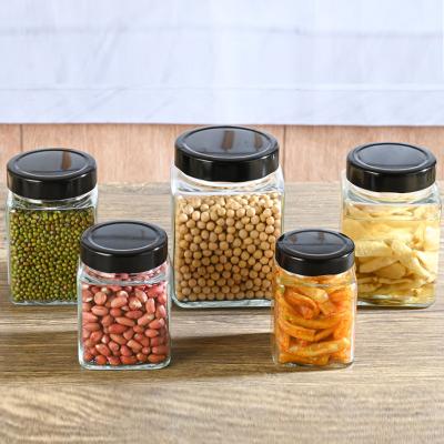 China Viable Can Be In Place Stored 100ml 200ml 280ml 380ml 500ml 700ml Food Storage Honey Glass Jar For Jam And Pickles With Metal Lid for sale