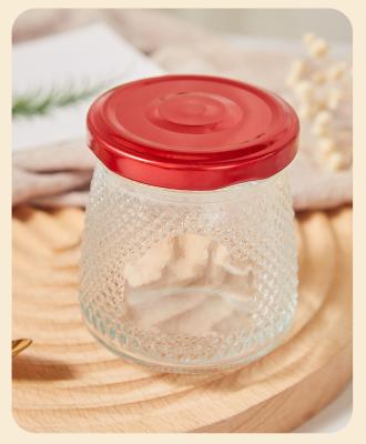 China New Big Mouth Food Fresh Baked Bird's Nest Honey Glass Mason Jar Striped Clear Sealed Jam Storage Jar for sale