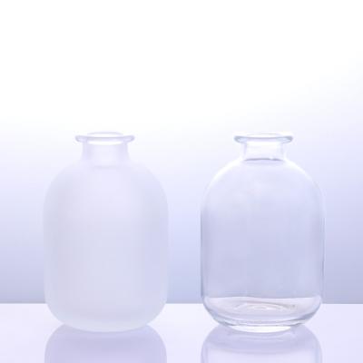 China Beverage Boston Wine Bottle 350ml Glass Empty Vodka Bottle With Cap For Whiskey Liquor for sale