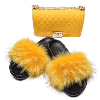 China 2021 Custom Cushioned Latest Trendy Ladies Party Raccon Fur Indoor Slide And Bags for sale