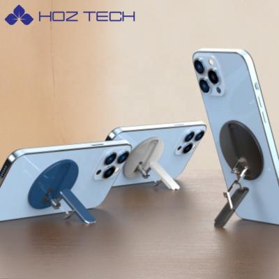 China Aluminum Alloy Adjustable Magnetic Foldable Stand&Grip Portable Invisible Magnet Phone Holder for sale