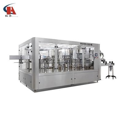 China Three-in-One Automatic Food Glass Bottle Drinking Water Filling And Capping Machine Production Line for sale