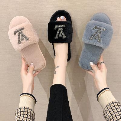 China Trend 2021 fashion autumn and new winter drill flat bottom slippers fashion cotton bright warm a-line home slippers for sale