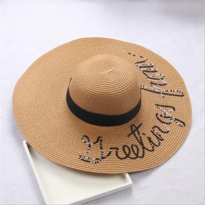 China Image Summer 100% Brim Letter Embroidery Beach Displacement Straw Sun Hats For Women Wide Paper Lady for sale