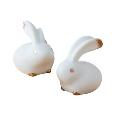 China Modern Nordic Crafts Biscuit Rabbit Ceramic White Animal Ornaments TV Cabinet Porch Creative Home Decoration for sale