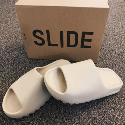 China Fashion Trend Custom Designed Yeezy Slides Sunmmer Sandals Women Men Outdoor Eva Yeezy Slides Indoor Black for sale