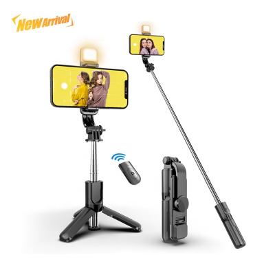 China Mini Portable Flexible Selfie Stick Folding Tripod 3 in 1 Handheld Telescopic Selfie Stick Mini Fill Light 360 Degree Selfie Stick for sale