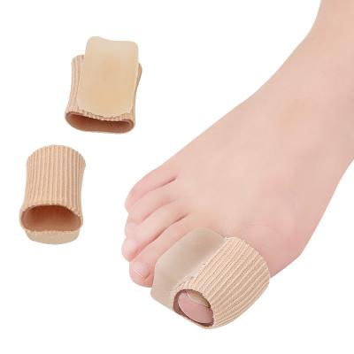 China Soft and Comfortable Toe Tubes Sleeves with Silicone Gel Toe Separator Toe Splint Straightener Orthopedic Brace for sale