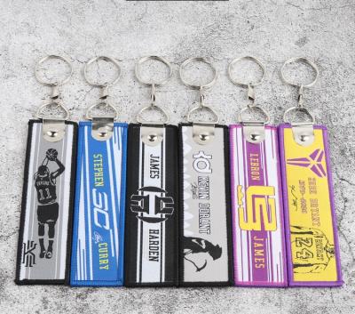 China Sports Name Key Tag Basketball Custom Cloth Embroidered Cloth Ring Patch Holder NBA Team Logo Key Chain for sale