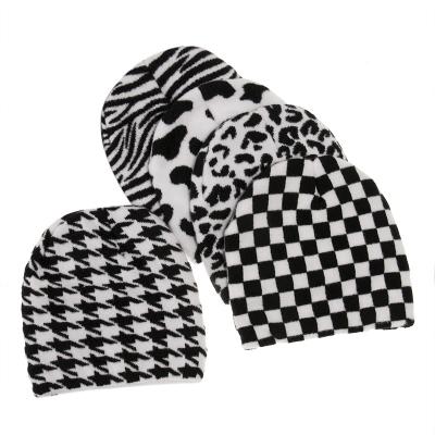 China Warm Black and White Striped Knitted Beanie Hat for Women Woolen Hats Plaid Winter Hat Feminine Warm Hat for sale