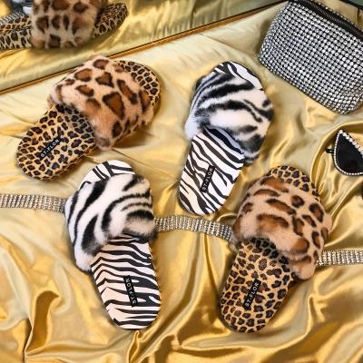 China Fashion Trend Winter Faux Fur Leopard Slippers Women Comfortable Furry House Warm Fuzzy Sandals For Ladies 2021 for sale