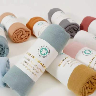 China Custom Printed Anti-bacteria Baby Muslin Wraps Bamboo Plain Solid Muslin Wrap Blanket for sale