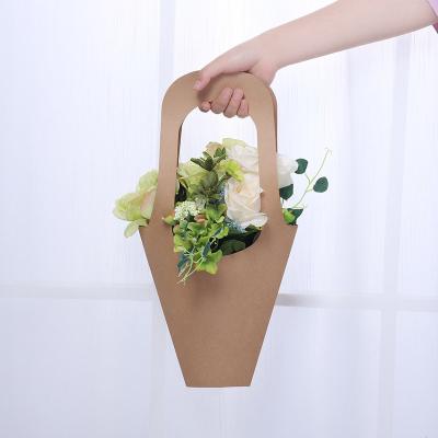 China Recycled Materials Flower Gift Wrapping Paper Bag Wholesale Kraft Flower Bouquet Bags for sale