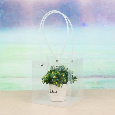 China Transparent Waterproof Flower Wrapping Hand Bag Wholesale Transparent Packaging Flower Bags For Bouquets for sale