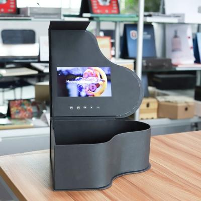 China Hot Sale Paper Video Media Player 7 Inch LCD Display Light Control Packaging Box Piano Shape Video Gift Flower Box for sale