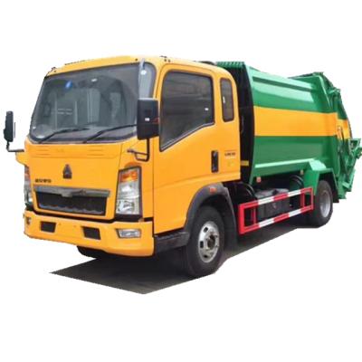 China HOWO 4X2 8m3 Garbage Compactor Truck 5tons Waste Collector Truck Compressed Garbage Truck for sale