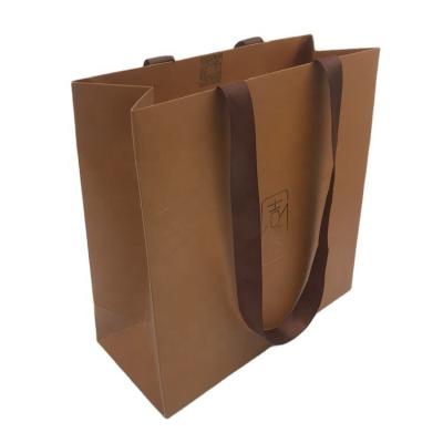 China Custom Wholesale Biodegradable Luxury Custom Logo Ribbon Handles Birthday Tea Packaging Gifting Paper Bag for sale