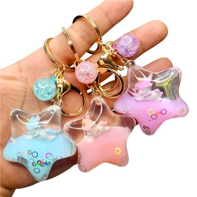 China Portable Creative Acrylic Unicorn Daisy Floating Keychain Charm Bag Children Liquid Key Chain Pendant Gift for sale