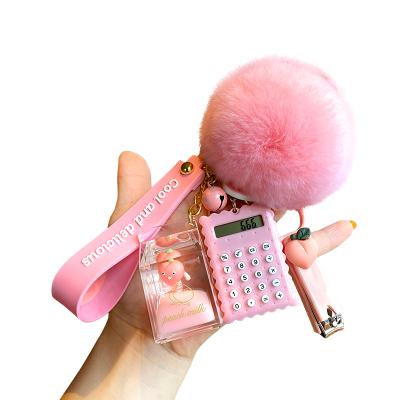 China Promotion Gift Cute Crystal Milk Bottle Hairy Ball Flowing Pompom Liquid Key Chain Pendant for sale