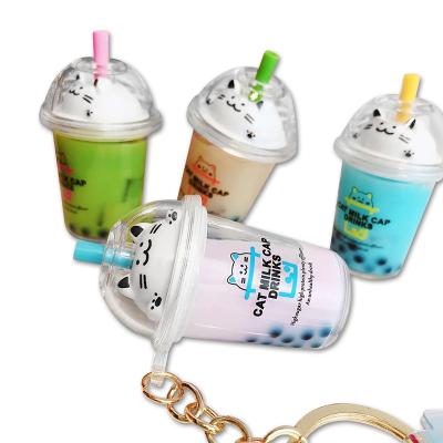 China 2021 Cat Mini Milk Tea Cup Keychain Environmentally Friendly Acrylic Liquid Quicksand Best-Selling Cartoon Key Chain for sale