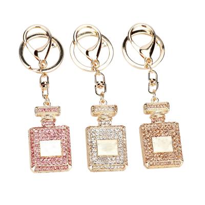 China Advertising Drop Shipping Perfume Bottle Key Chain Women Bag Creative Charm Crystal Rhinestone Key Chain Ring for sale