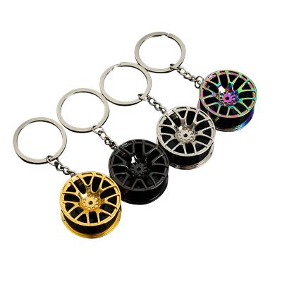 China Promotional Gifts Roll Rim Car Keyring Luxury Zinc Alloy Wheel Tire Styling Car Key Chain for sale