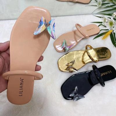 China New Summer Trend Fashion Flip Flops Slippers Flat Butterfly Sandal For Women Beach PVC Slipper for sale