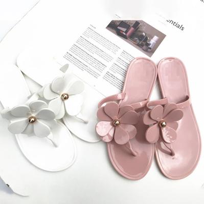 China Fashion Trend New Ladies Flower PVC Beach Sandals Shoes Crystal Jelly Flat Slipper Women Flip Flop Slippers for sale