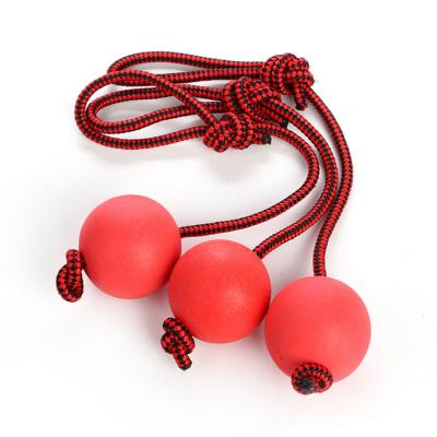 China Toy Pet Molar Toys Soft Solid Resistance Elasticity Tied Rubber Ball Bite For Dog And Cat for sale