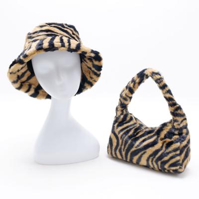 China 2022 Fashion Daily Zebra Pattern Winter Women Hot Selling Fur Bucket Hat Custom Made Matching Bag for sale