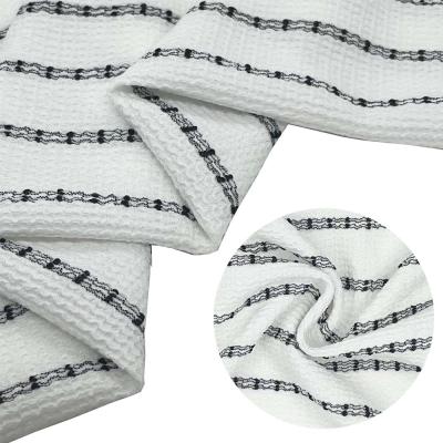 China Anti-static high quality 100% polyester stripe crepe fabric black warp knitted fashion white fabric for dress for sale