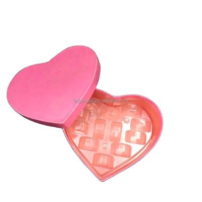 China Recyclable Empty Chocolate Box Red Macaron Heart Shape Custom Design Black Gold Christmas Gift Boxes Packing Box With Clear Plastic Insert for sale