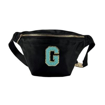 China 2022 Wholesale Hot Selling Solid Black Waist Bags Pussy Pack Kids Girls Water Proof Waterproof Nylon Pussy Pack With Letters Logo For Women for sale