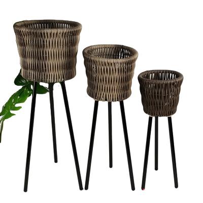 China Southwestern Handmade Rattan Garden And Home Decor Flower Pot With Legs for sale