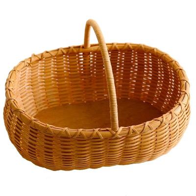 China Sustainable Handwoven Indonesian Handwoven Basket Household Oval Fruit Oval Fruit Picnic Picnic Basket for sale