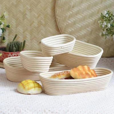 China Sustainable Vietnamese Fermented Oval Storage Basket Woven Rattan Bowl Country Bread Basket Rattan for sale