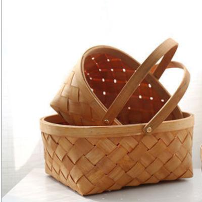 China Chinese Wooden Handwoven Picnic Basket Folding Egg Oval Fruit and Bread Storage Hand Held Basket for sale