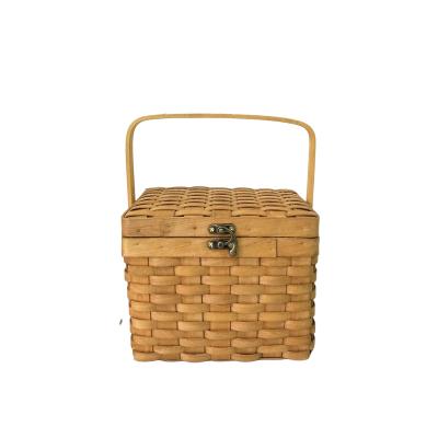 China Sustainable Japanese Rural Woven Portable Woodchip Household Storage Box Picnic Basket With Cover for sale