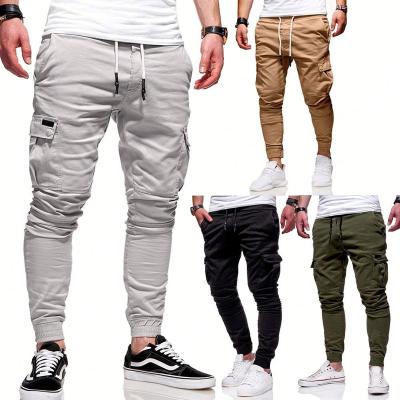 China Anti-Wrinkle Men Running Sports Pants Overall Elasticity Legging Jogger Training Pants For Men Plus Size Mens Pants And Trousers With Pockets for sale