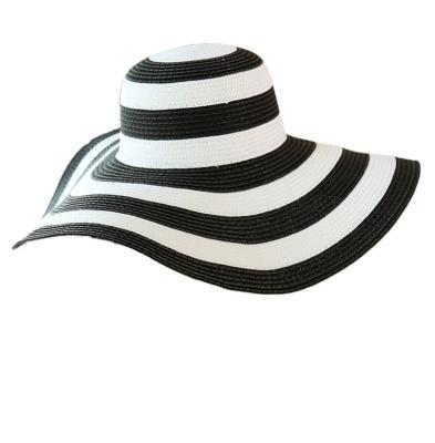 China Wholesale Striped Brim Large Wide Floppy Hat Classic Black And White Striped Beach Straw Hat for sale