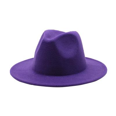 China Image 2021Autumn and Korean felt hat wholesale new winter style jazz hat solid color big markup runway edge British shiny flat wool hat for sale