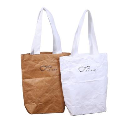 China Custom Goods Brown Tote Storage Paper Beach Tyvek Folding Waterproof Washable Shopping Bag for sale