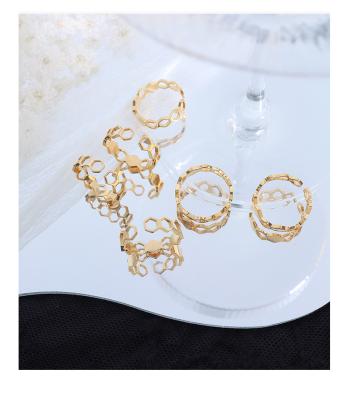 China TRENDY Fashion Adjustable Honeycomb Shape Design 18k Gold Plated Hollow Ring For Women Men Romantic Rings for sale