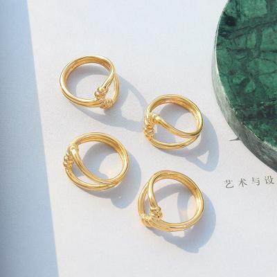 China TRENDY Hot Selling Hollow Stainless Steel Jewelry Knotted Ring 18k Gold Plated Stacking Rings Wholesale for sale