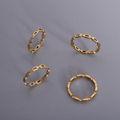 China FASHIONABLE French Style Ring 18k Gold Plated Hollow Jewelry Gold Titanium Steel Ring Wholesale For Women for sale